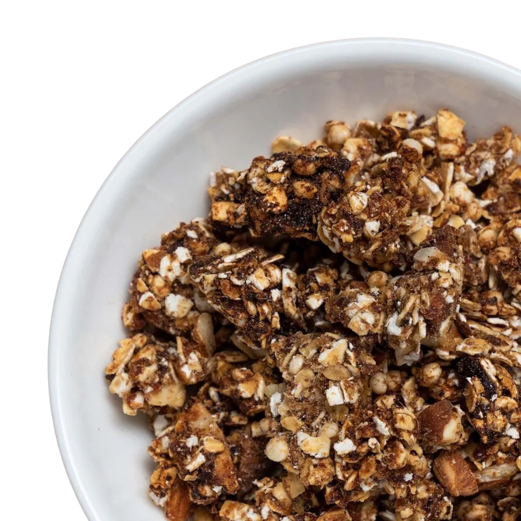 Knuspriges, gelbes Sanddorn-Granola in einer weissen Schüssel.